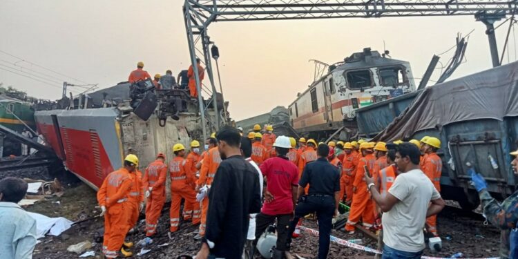 Rescue personnel work at the site of the derailed trains in Odisha on Saturday, 3 June, 2023.