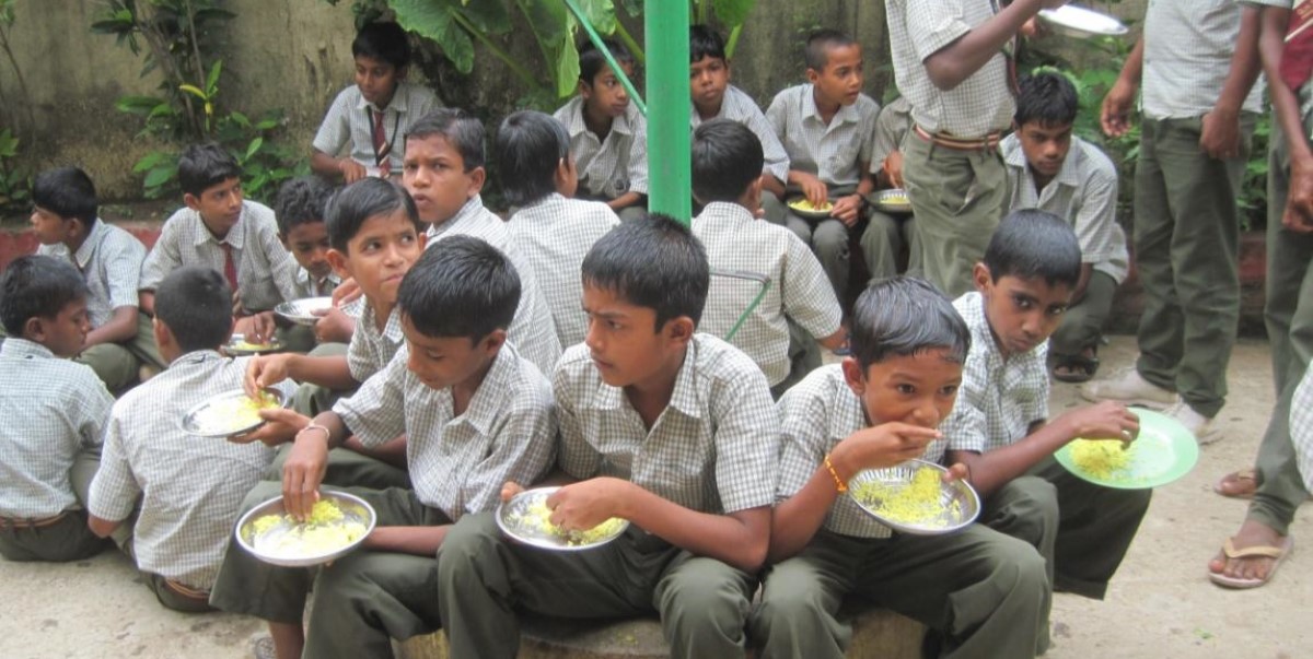 File photo of students having a midday meal.