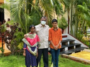 Rita and Alex, at their young age with Dr Gandhimathinathan. (Supplied)