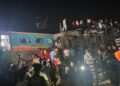 One of the coaches “was pushed into the ground " as another from a neighbouring train collapsed on top of it, passengers said. (Supplied)