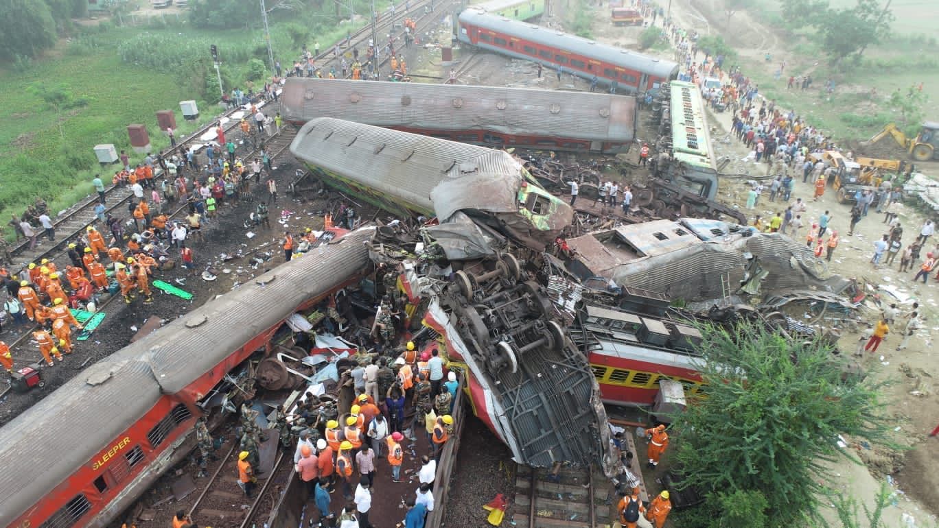 Rescue personnel work at the scene of accident near Bahanaga Railway Station in Odisha’s Balasore district. (Supplied).