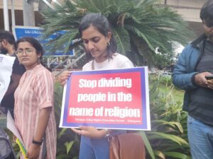 A placard being displayed at the at the protest in Hyderabad over Manipur viral video incident