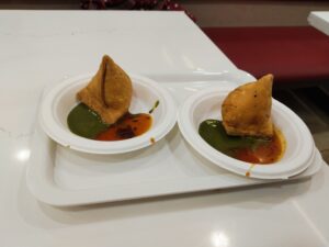 Loyal customers vouch for the samosa and onion kachori at Asha Sweet Center.