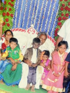 Jashwanth with his grand father Munimadashetty in a function. Jashwanth died due to the rare genetic condition.