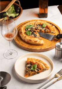 The Chicago deep dish pizza at Nomad is a must-try (supplied)