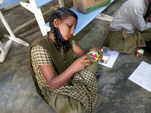 Mahesha conducts Rubik's cube workshops for all types of children. (Supplied)