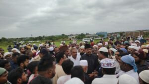 Residents conveying their demands to Bidar MLA Rahim Khan (in brown cap) of Congress at burial.