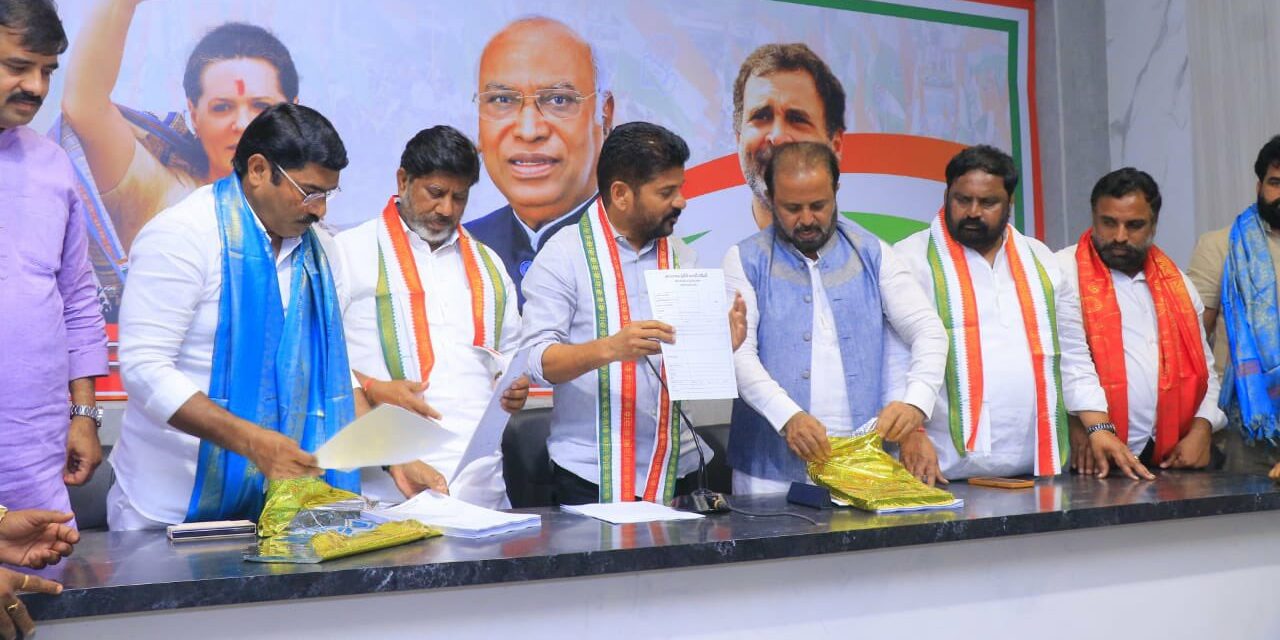 TPCC president Revanth Reddy releasing the application form for ticket aspirants in Hyderabad.