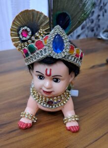 Janmashtami season sees Saritha bustling with orders for traditional Krishna figurines and mechanised Baby Krishna dolls. 