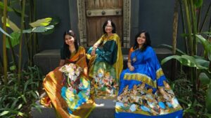 Ariya Nair (Centre) with daughters Mrinalini (L) and Devyani (R). 