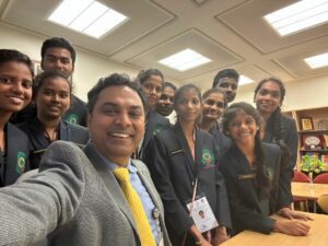 IMF's KV Subramanian with the student delegation. (Supplied)