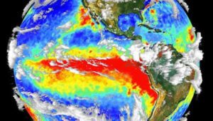 Combined 3-D cloud and surface temperature data in this image shot by the NASA Terra satellite, shows an earlier full-blown El Niño condition. The red area denotes warm water off the coast of western South America. Photo: NASA