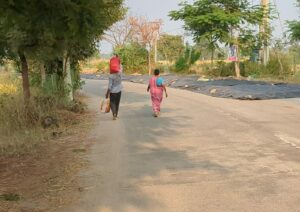 An old woman, Lachhamma Boddolu, struggling to walk in Chintamadaka.