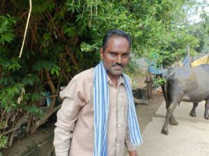 Tirupathi with his buffalo. (Sumit Jha/South First)