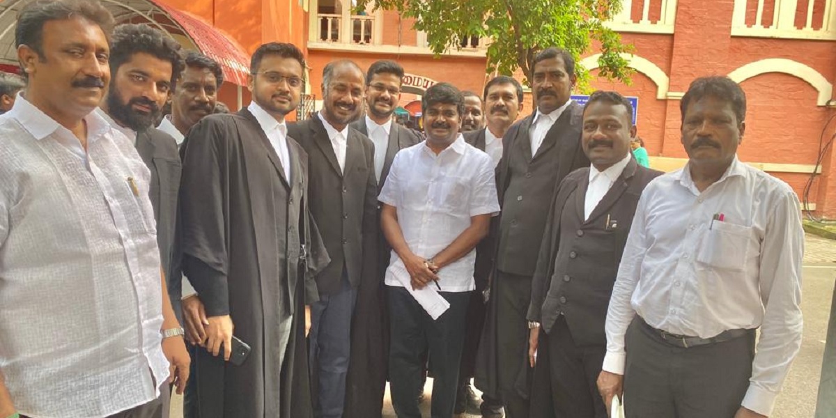 Former health minister Vijayabaskar with his advocates at the Madras High Court. (Supplied)