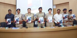 Cyberabad Commissionerate police Commissioner Avinash Mohanty (third from left) and other officers releasing Annual Report 2023 at the Annual Press Meet on 23 December. 