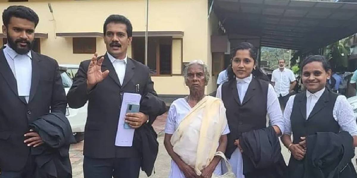 Mariyakutty with her lawyers. (Supplied)