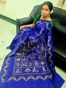 Meenakshi Devaraj in the final version of the saree she designed to preserve the dying art of sikku kolam. (Supplied)