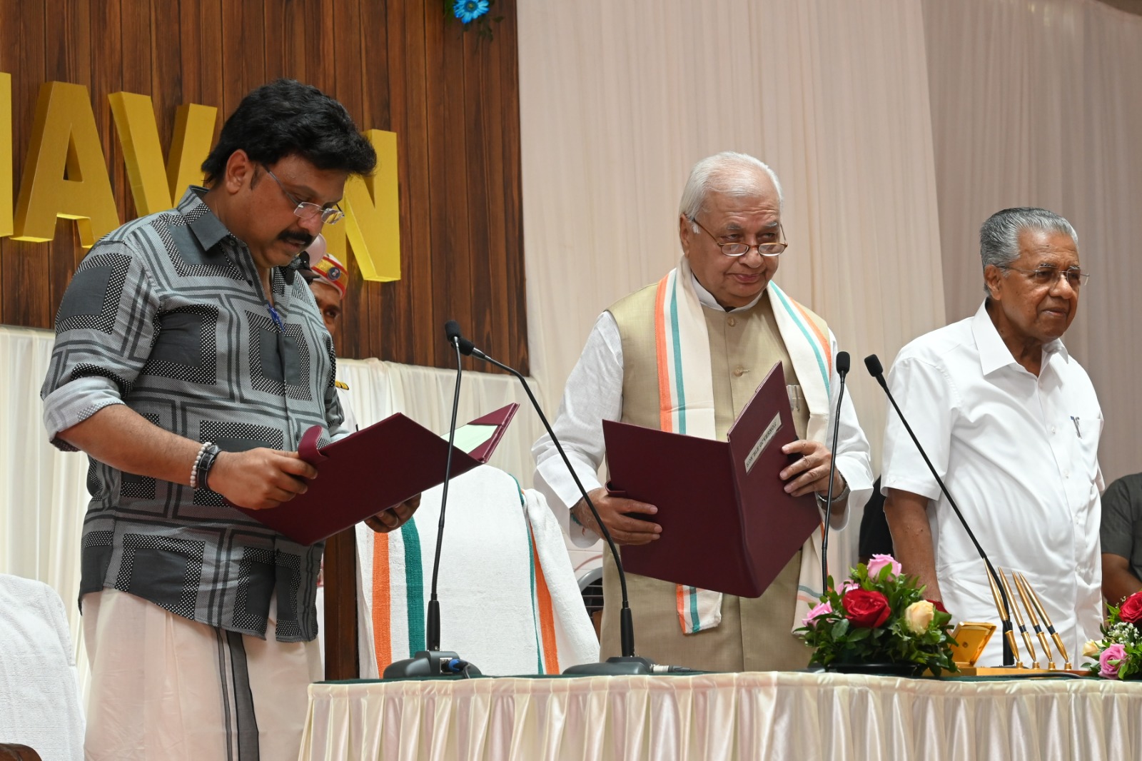 Governor Khan administering the oath of office to KB Ganesh Kumar. (Supplied)