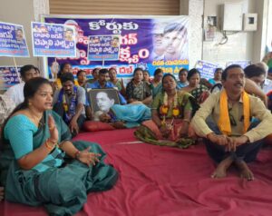 Srinu's mother and elder brother with Sainik dal in Vijayawada. (South First)