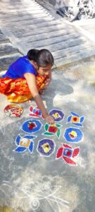 Colurful muggu (rangoli) adorns the entrance of every home. (Supplied)