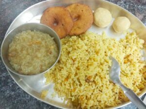 Traditional meal of payasam, vadas, sesame laddoos, ariselu are crucial to the festival. (Supplied)