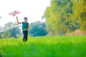 Every community in the village would assemble and enjoy Makar Sankranthi, fly kites together. (iStock)