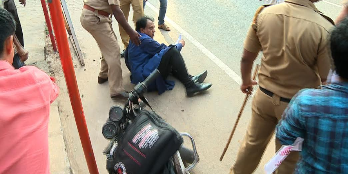 TP Sreenivasan after being attacked by an SFI activist in 2016. (Supplied)