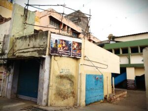 Posters of old films put up on the walls of Delite Theatre