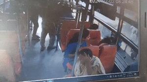 A grab from the CCTV footage from inside the bus showing the scooter overtaking the bus from left, and the accident.