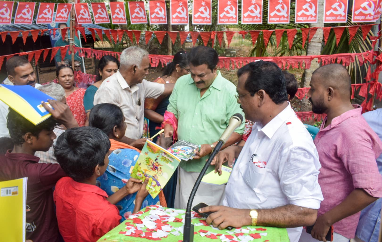 LDF candidate in Kollam M Mukesh being welcomed with books. (Supplied)