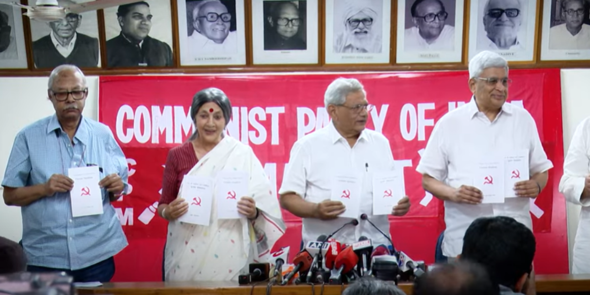 CPI(M) leaders with the party's manifesto.
