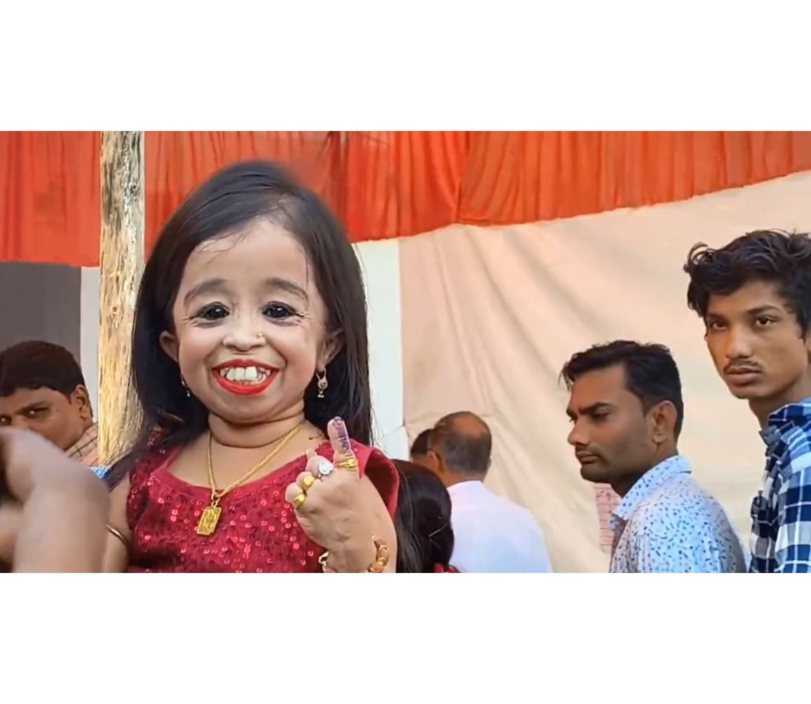 Jyoti Kishanji Amge, recognised by the Guinness World Records as the world's shortest living woman, exercised her franchisee at a polling station in Nagpur. Her height was restricted due to primordial dwarfism, a genetic disorder. She is 62.8 cms tall. (Screengrab)