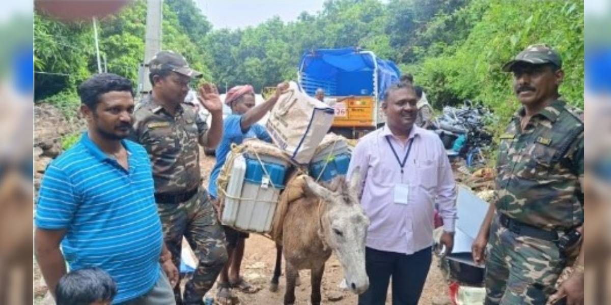 The horses were seen carrying the EVMs on a path atop a hill. (X)