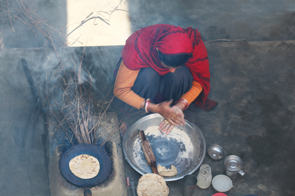 Woman cooking at home. (iStock)