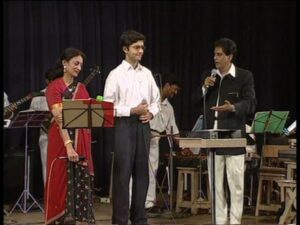 Uma and Ramanan performing on stage